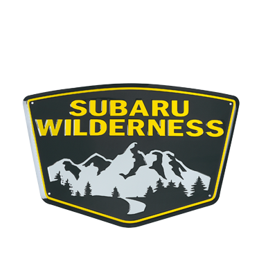 subaru wilderness metal sign with a foresty mountain landscape