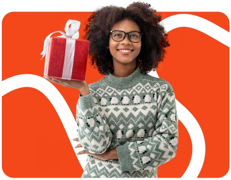 woman with glasses holding gift