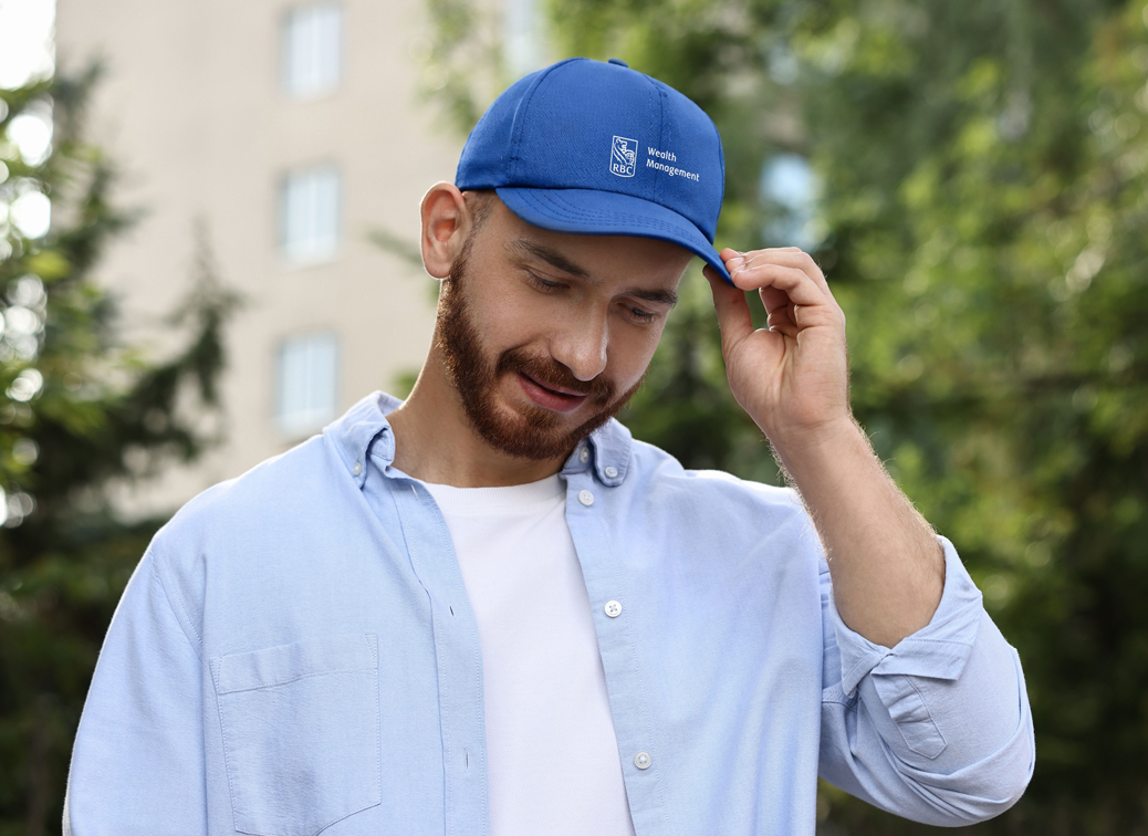 man with a blue RBCWM baseball cap on