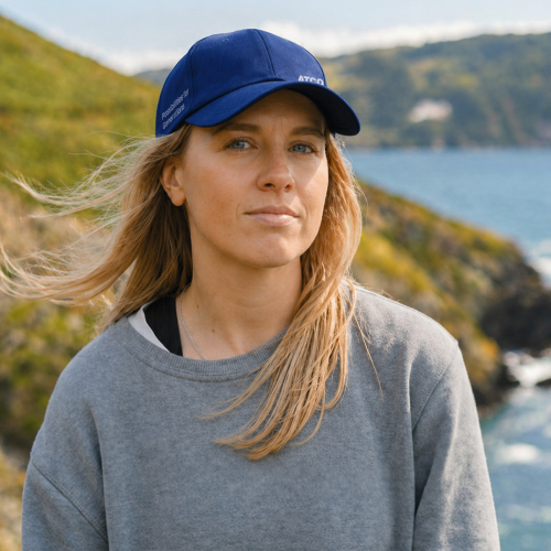 Woman outdoors wearing promotional ATCO apparel