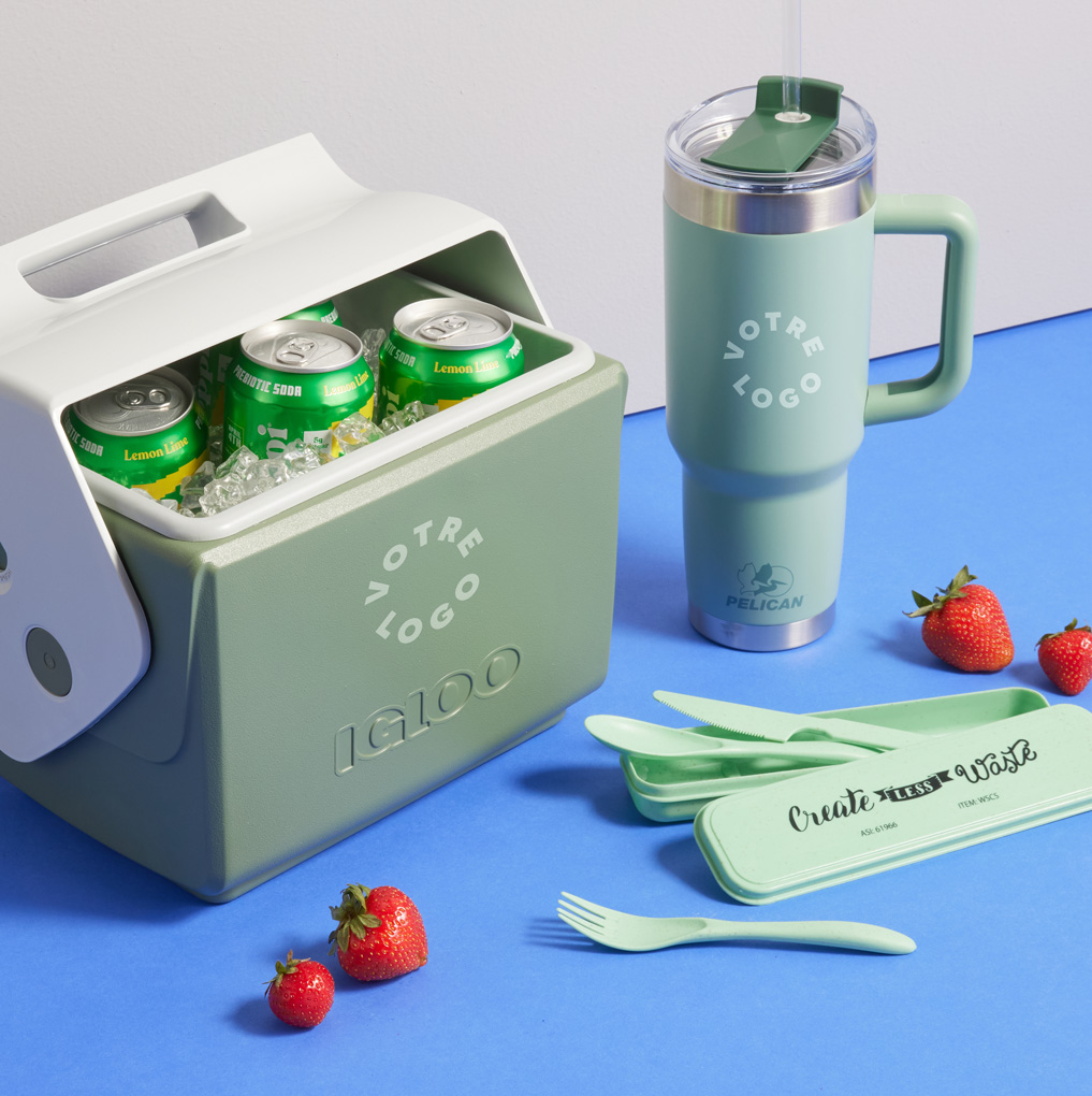 Green cooler with lemon-lime sodas and branded Pelican tumbler next to strawberries — eco promo captioned Good for the Planet.