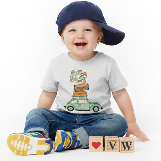 A toddler sitting down wearing a Toddler Road Trip Tee-shirt