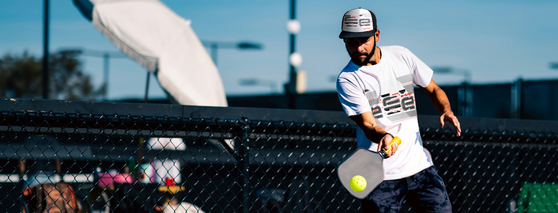 Audi Boutique Last Chance - man playing pickleball
