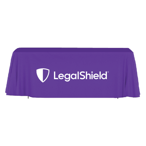 purple tablecloth with the LegalShield logo in white displayed in front