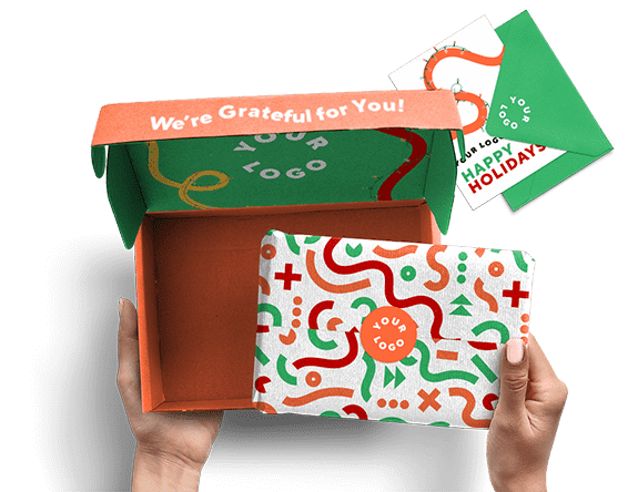 someone opening an artfully designed package