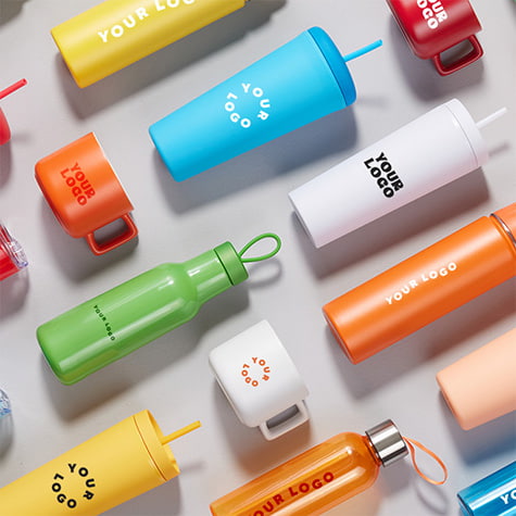 An assorted flay lay of colorful drinkware that is branded with your company's logo